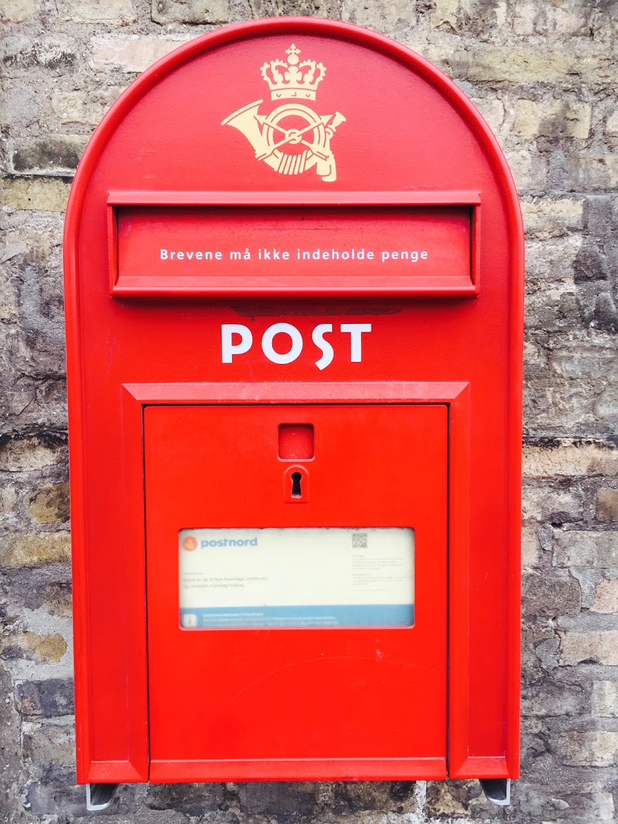 The distinct red Danish mailbox