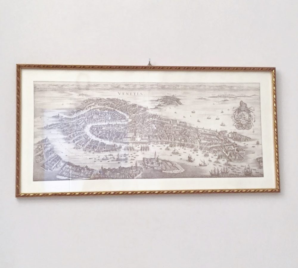 A photo of an antique engraving of Venice.