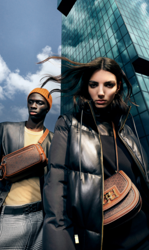 Image or a male and female model wearing Bally clothes and bags in Zurich Switzerland